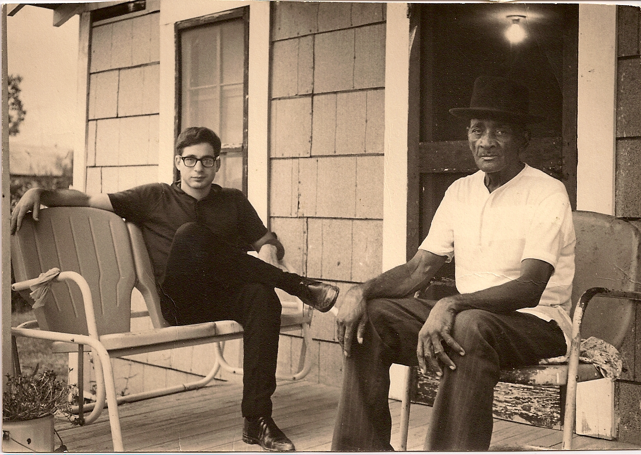 Mance Lipscomb and Michael Birnbaum on Mance's porch in 1966